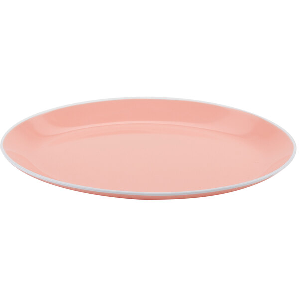 A pink plate with a white rim.