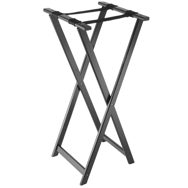 An American Metalcraft black wood folding tray stand with two legs folded on a table.
