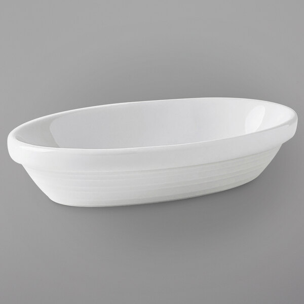 A white oval Tuxton China bowl.