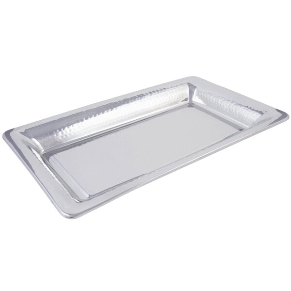 A close-up of a silver rectangular Bon Chef double wall platter with a hammered finish.