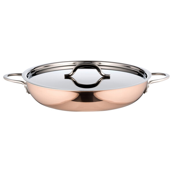A Bon Chef copper saute pan with a lid and handle.