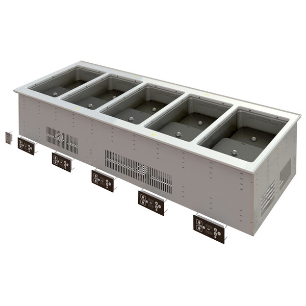 A white rectangular Vollrath drop-in hot food well with five grey rectangular metal containers inside.