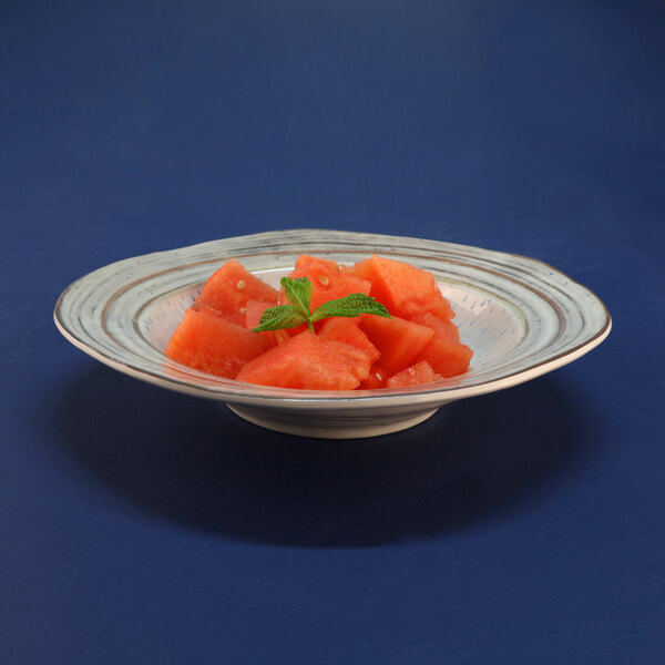 A bowl of watermelon slices in a Beach Design melamine bowl.