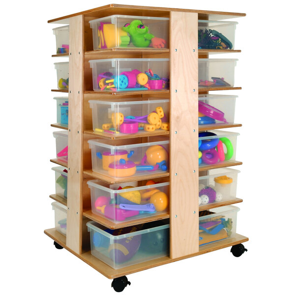 A Whitney Brothers wooden storage tower with plastic trays.