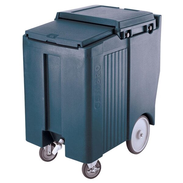 A Cambro slate blue mobile ice bin with wheels.