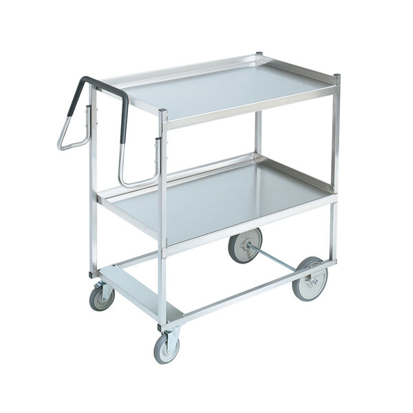 A silver stainless steel Vollrath utility cart with two shelves and a handle.