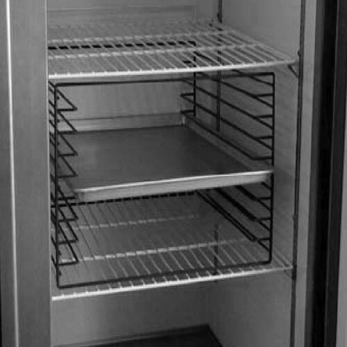 A Beverage-Air tray slide module in a refrigerator with shelves.