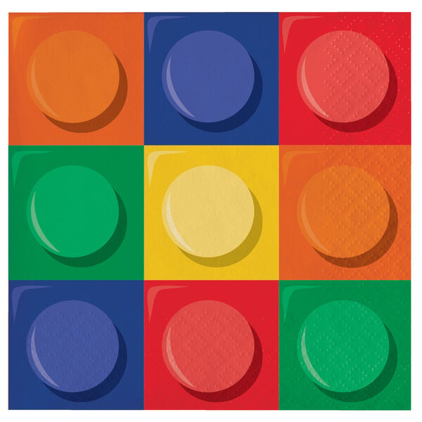 A colorful square beverage napkin with a red circle and shadow, featuring colorful lego blocks.