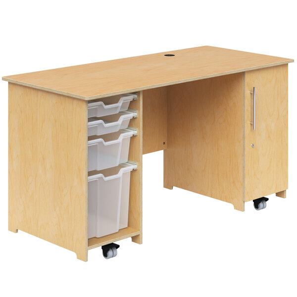 A Whitney Brothers mobile teacher's desk with wooden drawers and wheels.