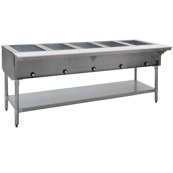 An Eagle Group stainless steel hot food table with an open base and five wells.