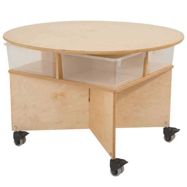 A Whitney Brothers mobile collaboration table with trays on wheels.