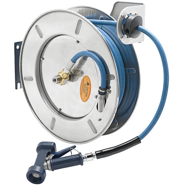 A T&S stainless steel hose reel with a hose attached.