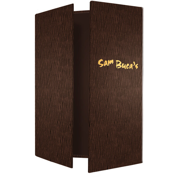 A brown leather Menu Solutions gatefold menu cover with black stripes on a table.