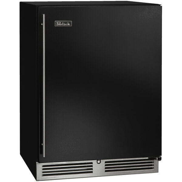A black Perlick undercounter refrigerator with a door open.