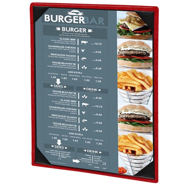 A red and white Menu Solutions menu board with pictures of burgers and fries on a table in a fast food restaurant.