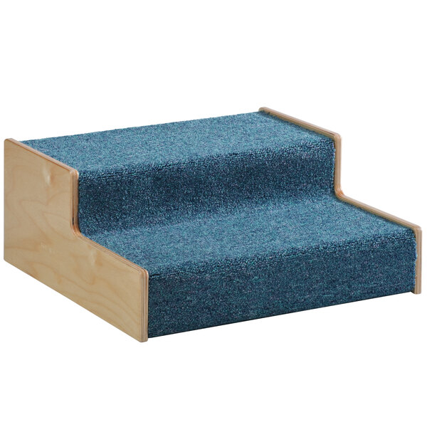Whitney Brothers blue carpeted Woodscapes steps with a wooden base.