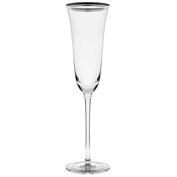 A 10 Strawberry Street clear wine glass with a long stem and silver rim.