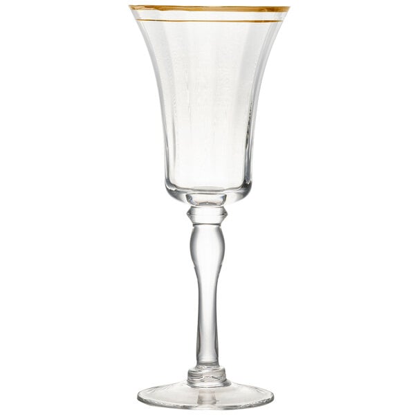 A clear glass with a gold rim on a white background.