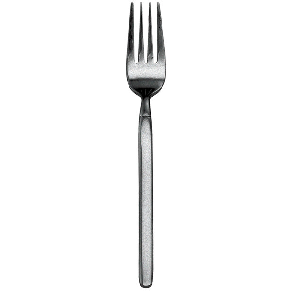 A close-up of a Walco stainless steel table fork with a fieldstone finish.
