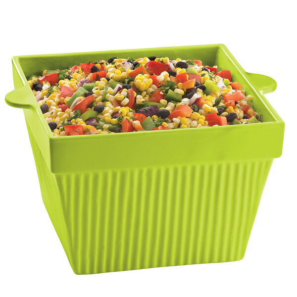 A Tablecraft lime green square condiment bowl filled with corn and vegetables.