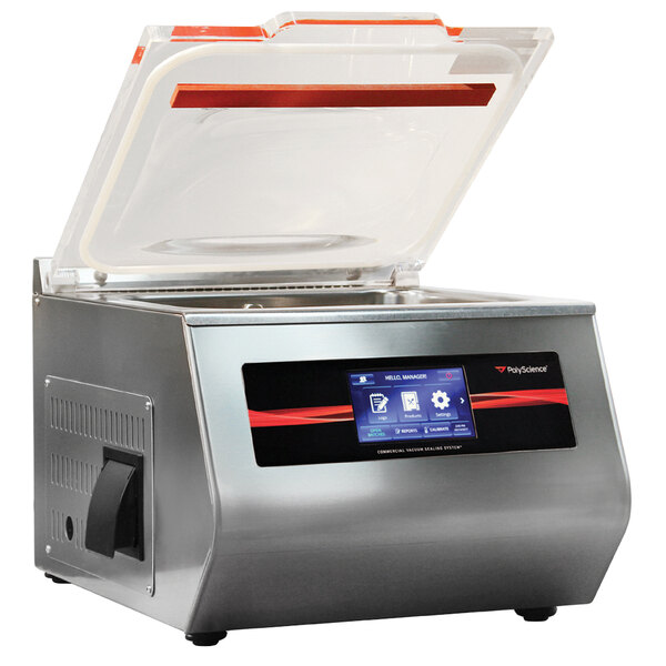 A silver Breville 400 Series chamber vacuum sealer on a counter with a clear lid and a red screen.