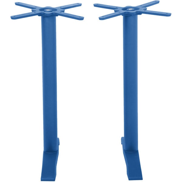 A pair of blue metal BFM Seating table bases with circular legs.