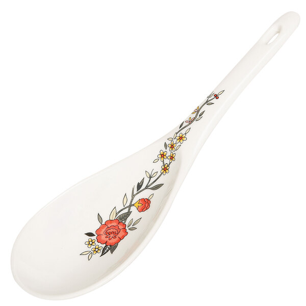 A white melamine rice ladle with a flower design on the end.