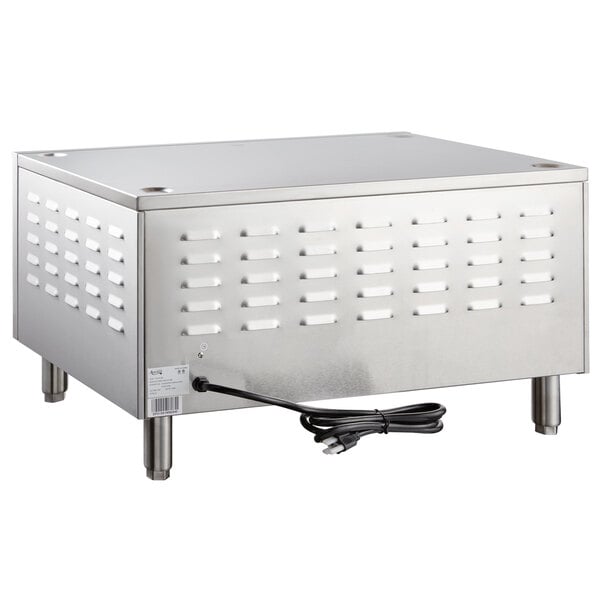 A stainless steel rectangular countertop oven with a power cord.