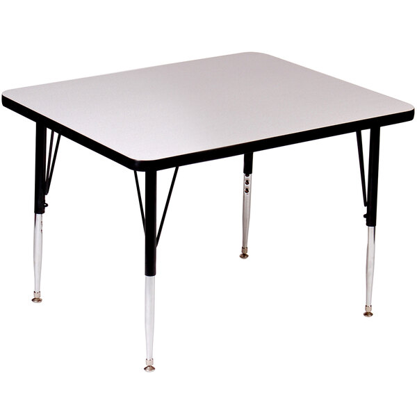 A square gray granite high pressure top activity table with black legs.