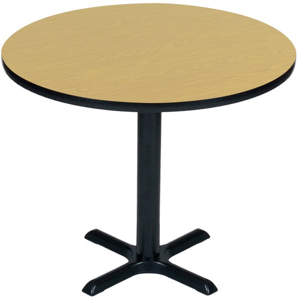 A round Correll table with a black base.