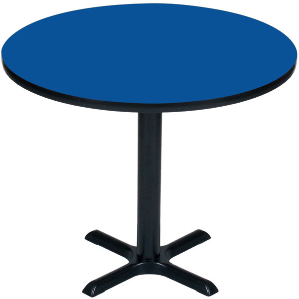 A Correll round blue table with a black base.