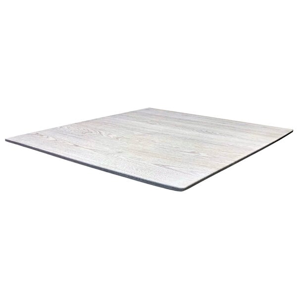 A white square wooden table top.