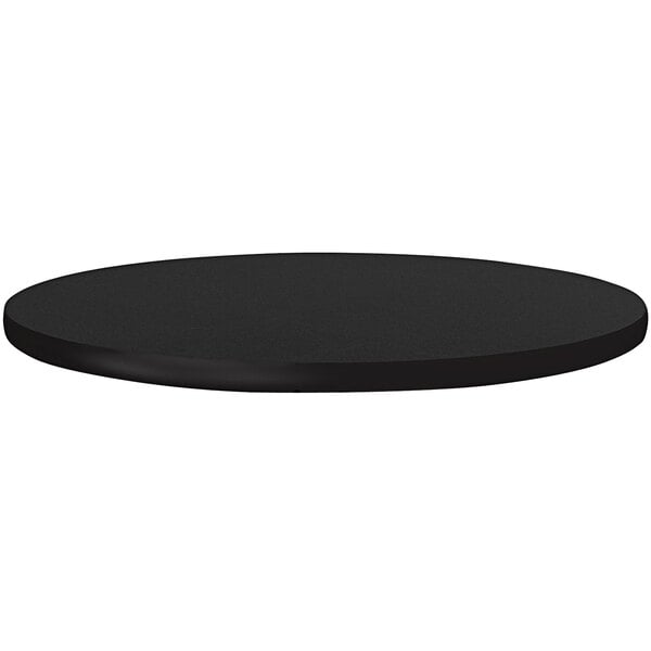 A Correll black granite round table top on a table.