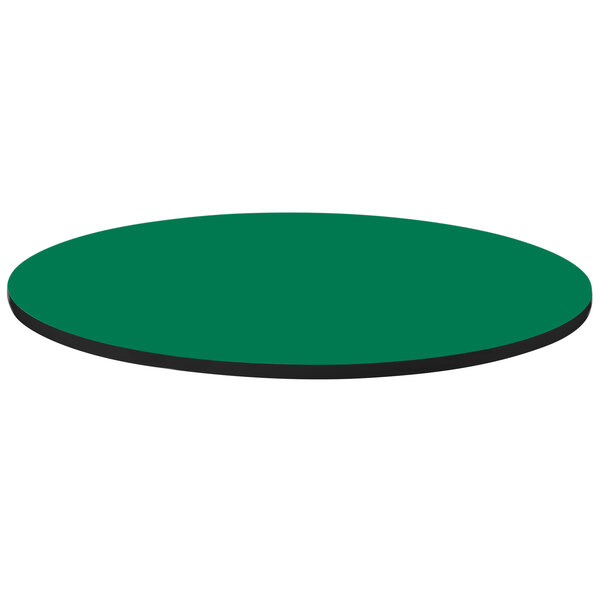 A green circular Correll table top with a black border.