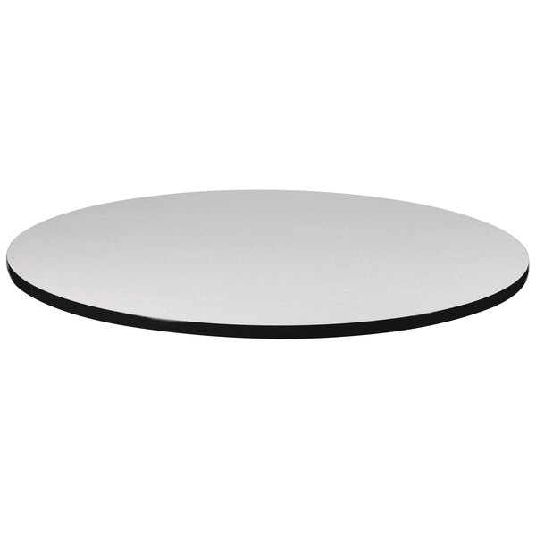 A Correll round gray granite table top with a black edge.