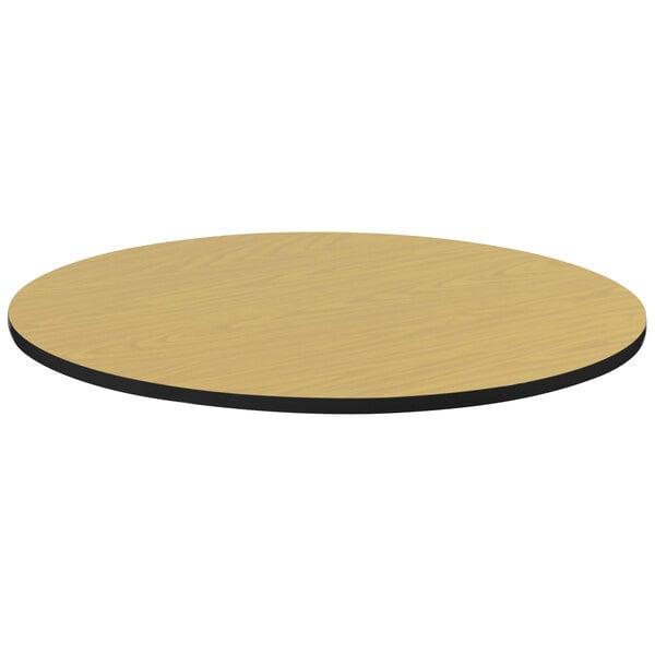 A Correll round wood table top with black edges.