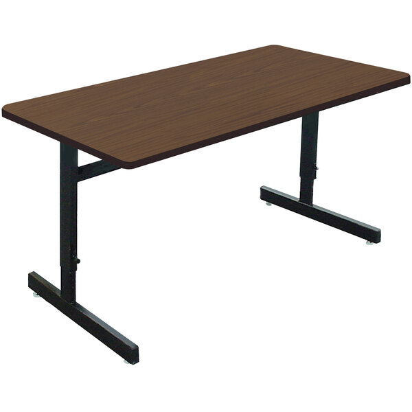 A brown rectangular Correll computer table with black metal legs.