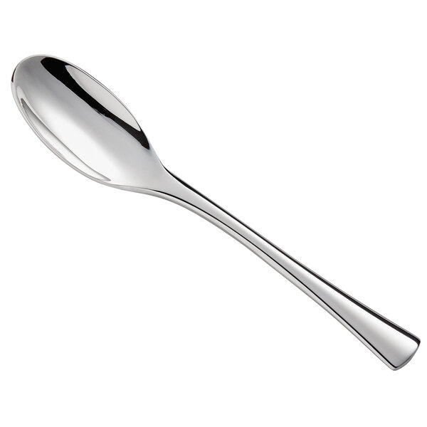 A Libbey stainless steel demitasse spoon with a silver handle and spoon.
