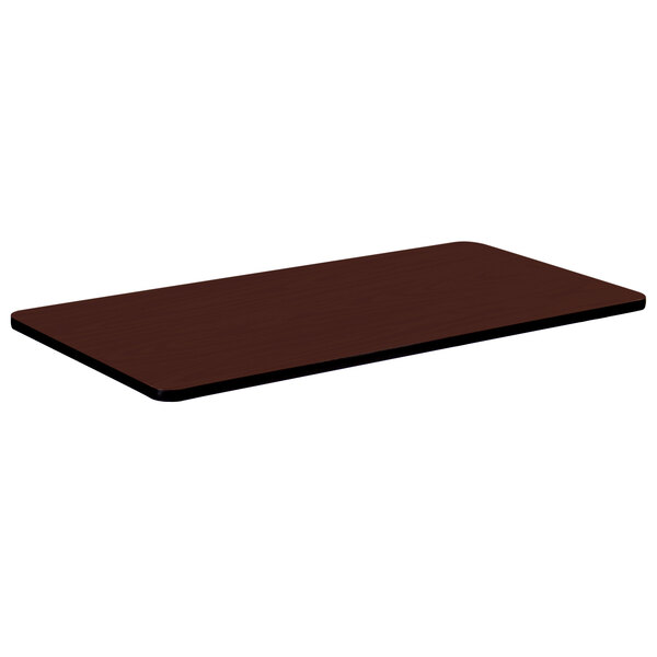 A rectangular brown table top with a black border.