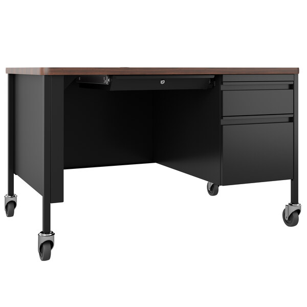 A black Hirsh Industries teacher's desk with a drawer and wheels.