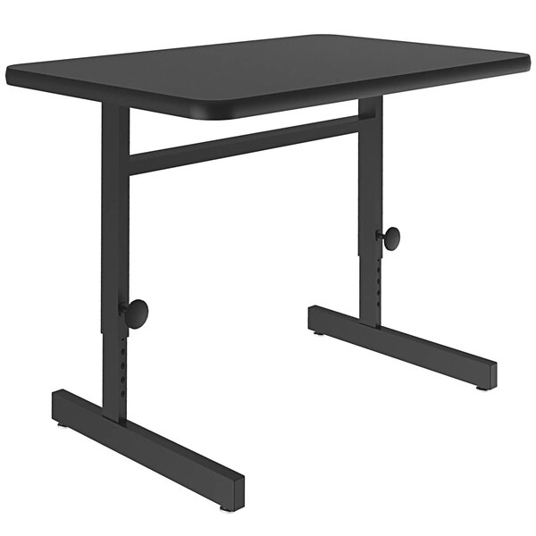 A black rectangular Correll computer table with adjustable height.