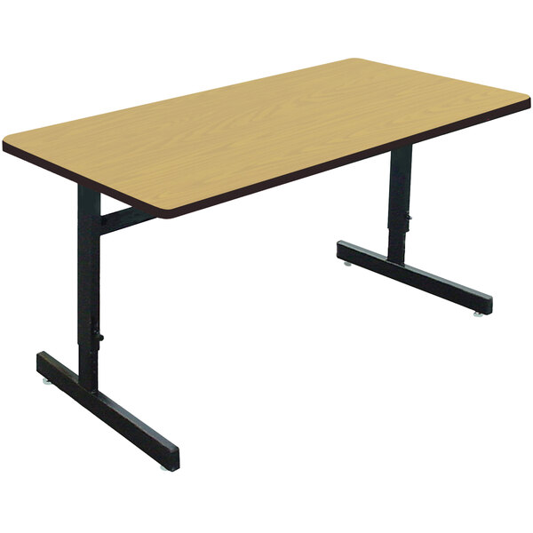 A Correll rectangular computer table with a black base and legs.