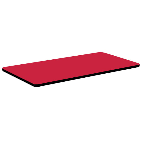 A red rectangular Correll table top with black edges.