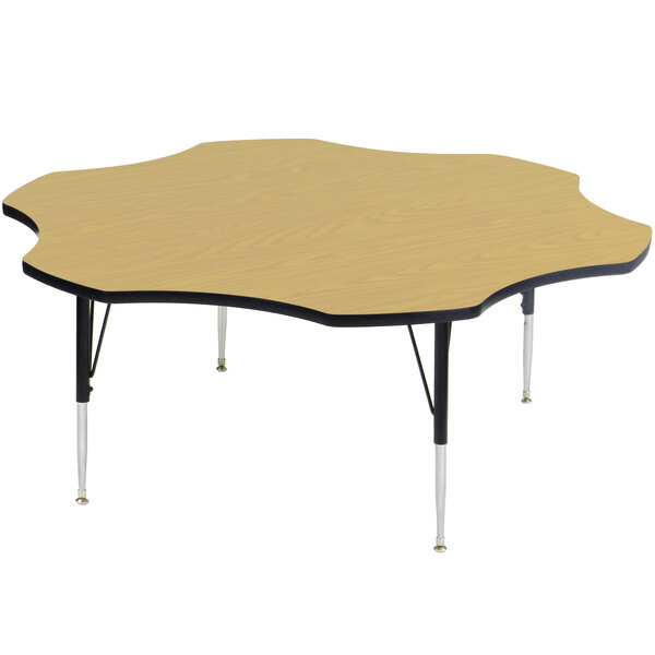 A Correll Flower Fusion Maple Finish activity table with an adjustable height and a flower shape on the top.