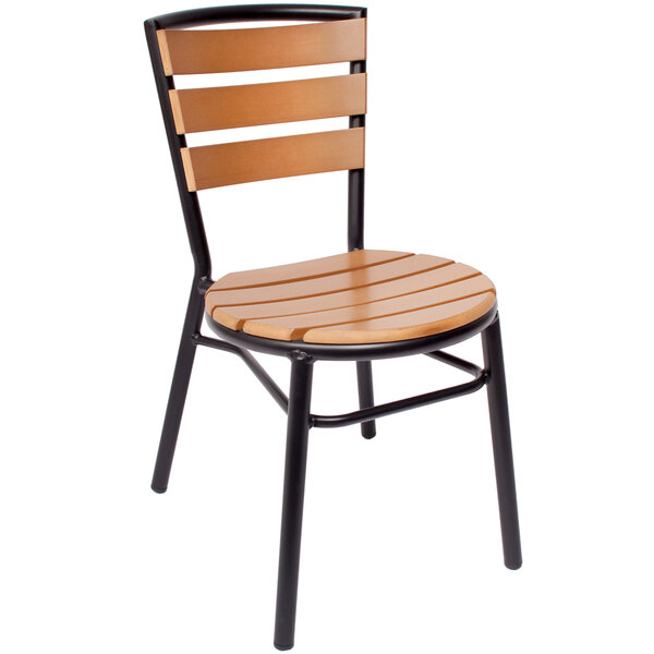 A BFM Seating Norden Outdoor side chair with a synthetic teak seat and black frame.