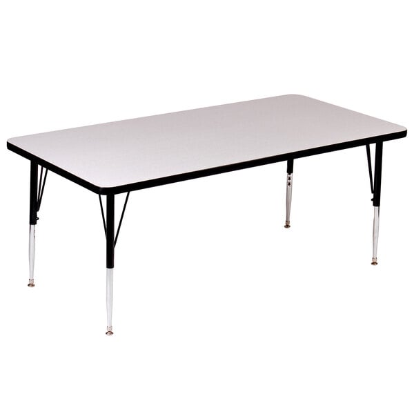 A rectangular gray granite finish activity table with black legs.