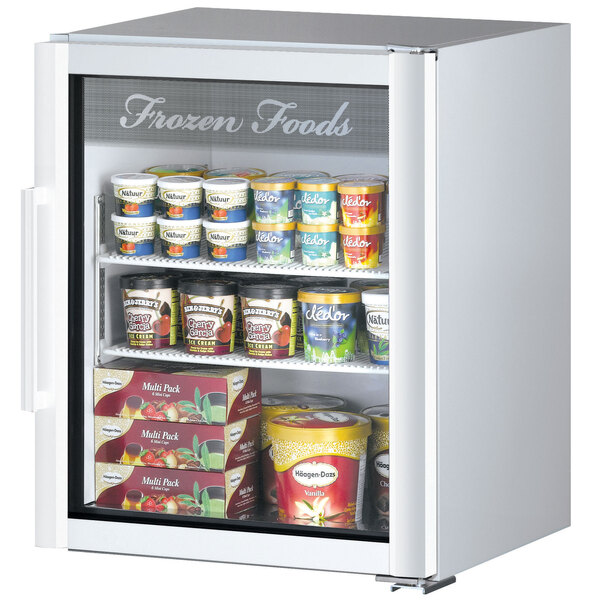 A white Turbo Air countertop display freezer with various frozen food items inside.