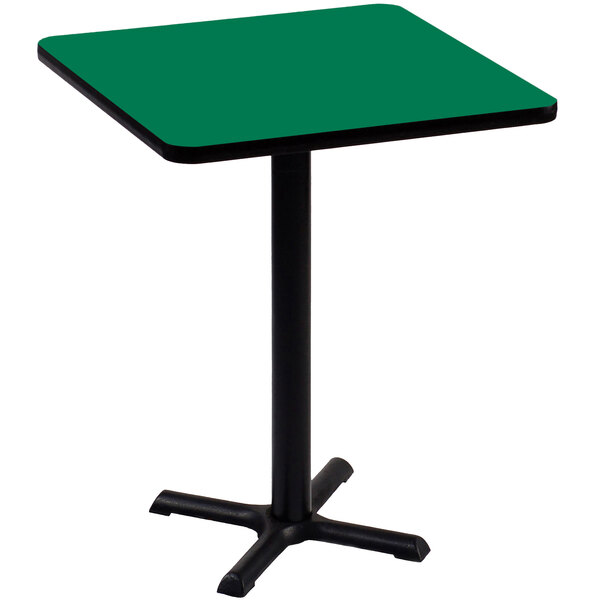 A Correll green square table with a black base.
