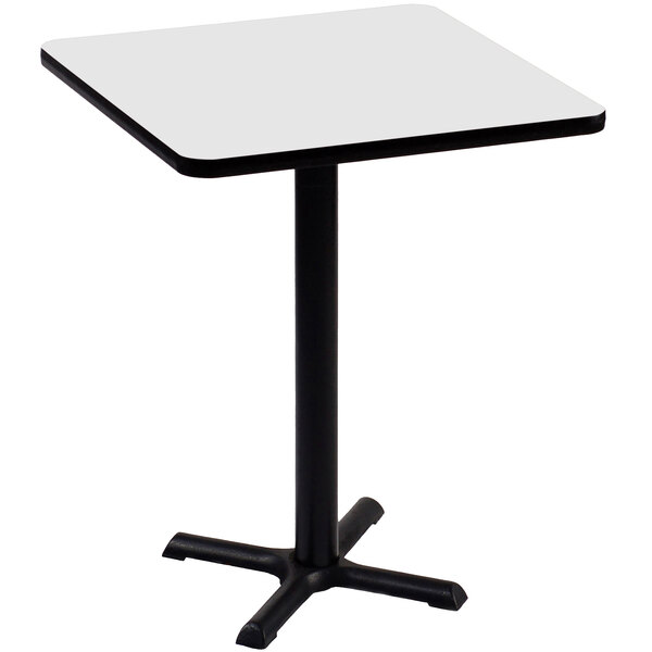 A Correll white square bar height table with a black base.