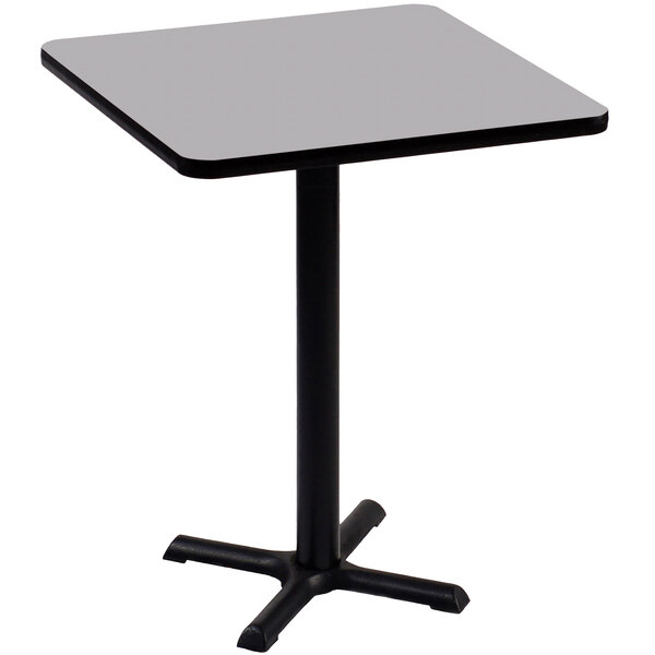 A Correll square table with a black base and gray granite top.